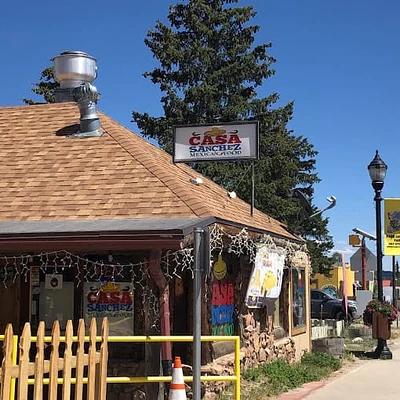 Casa Sanchez Fairplay storefront under the Main Street sign